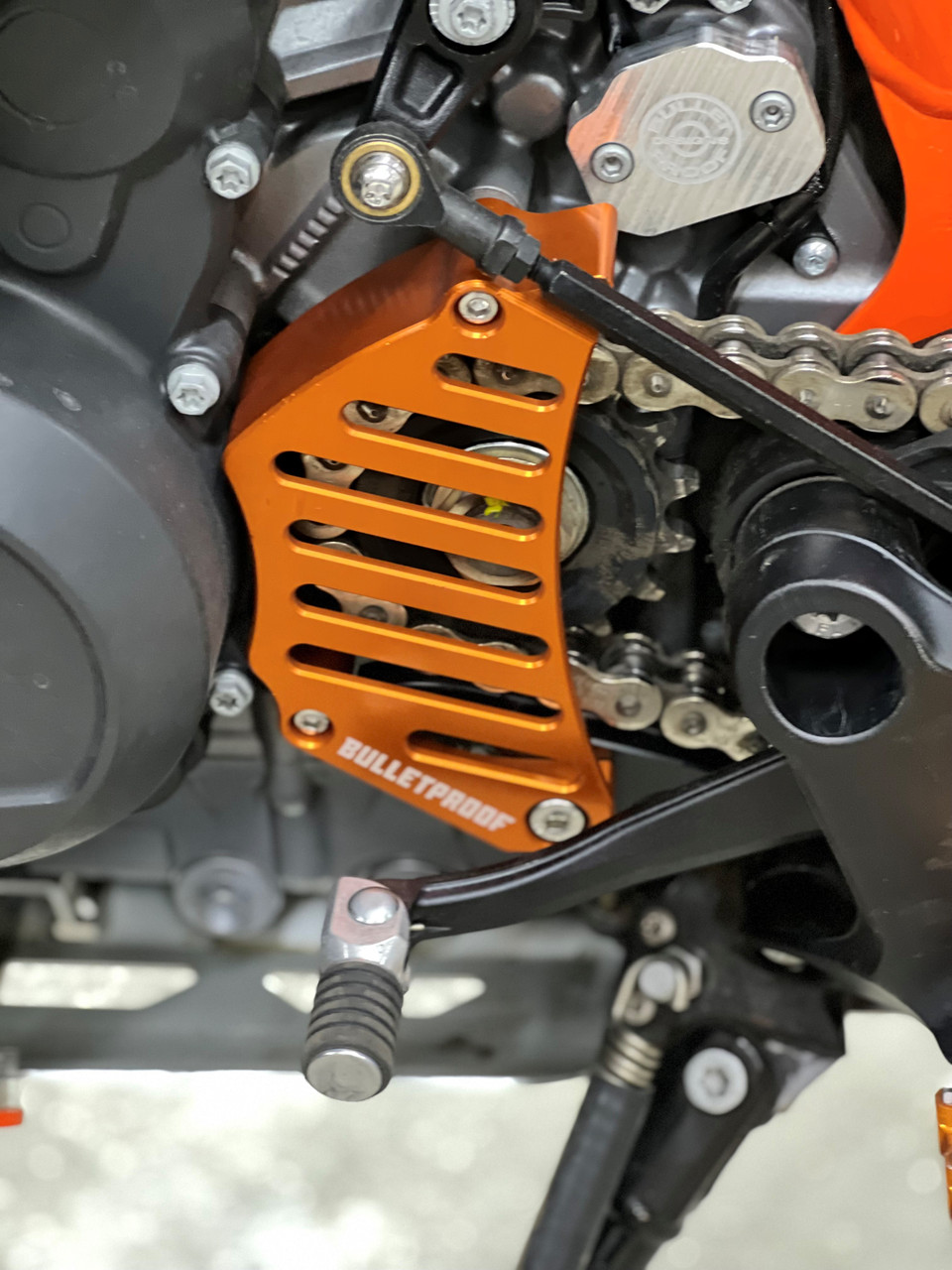NiceCNC Orange CNC Chain Case Cover Guard For KTM 790 Adventure S/R & 790/890 Duke 2021-2023
